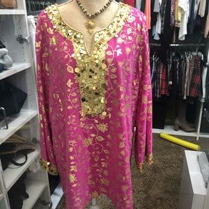 Long sleeve , formal top, w/ sequins.